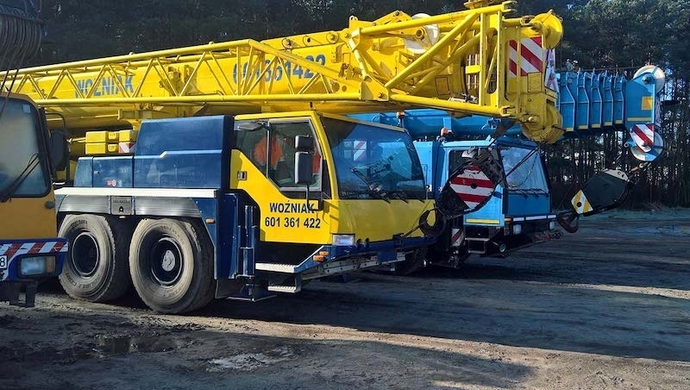 Wynajem dźwigów i podnośników - jak pomaga firmom pod względem biznesowym?