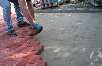 W Bagnie trwa wylewka asfaltu FOTO